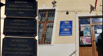După ani de zile de sfidare cu plăci negre au reapărut plăci oficiale pe sediul Primăriei Carei!