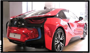 Flux24.ro: "Florian Coldea conduce un bolid de lux BMW i8 de culoare rosie!", Foto: captura video youtube