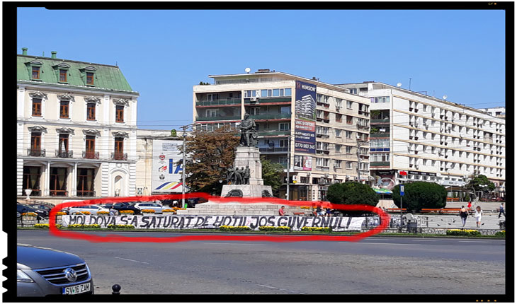 Incredibil! Poliția locală este folosită la IAȘI pentru a păzi un banner antiguvernamental neautorizat?